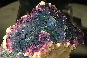 Close-up of colorful fluorite crystal with purple and blue hues