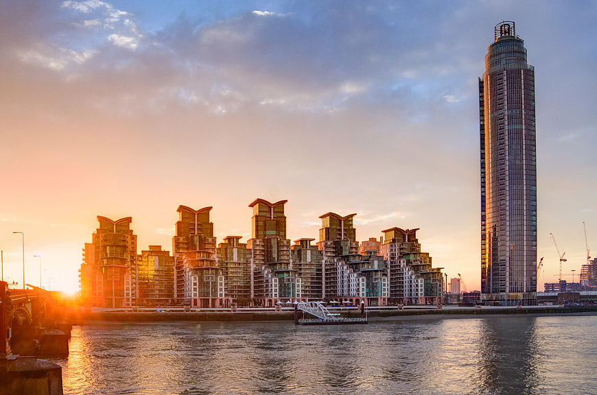 Sunset City Skyline with Modern Skyscrapers and Waterfront