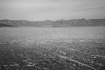 Aerial Black and White View of Los Angeles Skyline and Mountains