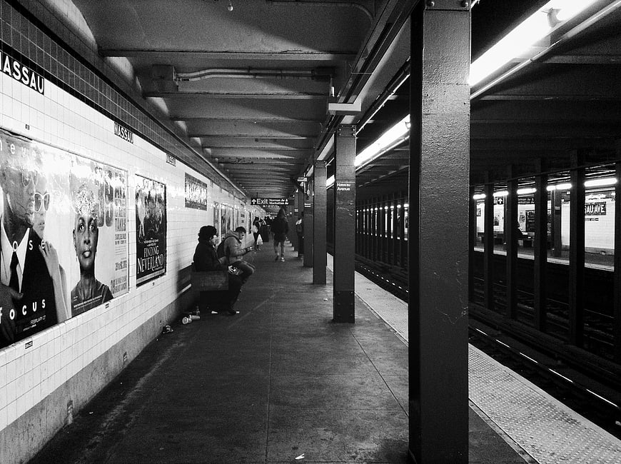 Black and white photo of Nassau Street subway station platform