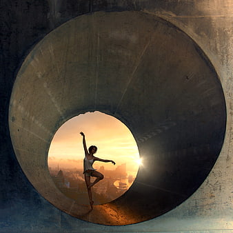 Dancer Silhouette in Concrete Tunnel at Sunset