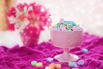 Pastel Conversation Hearts in Pink Bowl on Magenta Blanket