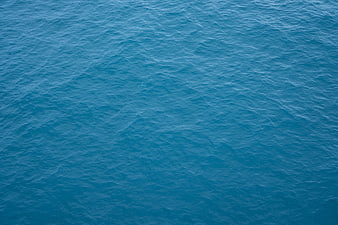 Aerial View of Blue Ocean Water Surface Texture