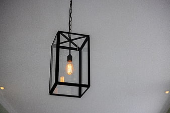 Modern black metal lantern pendant light with Edison bulb