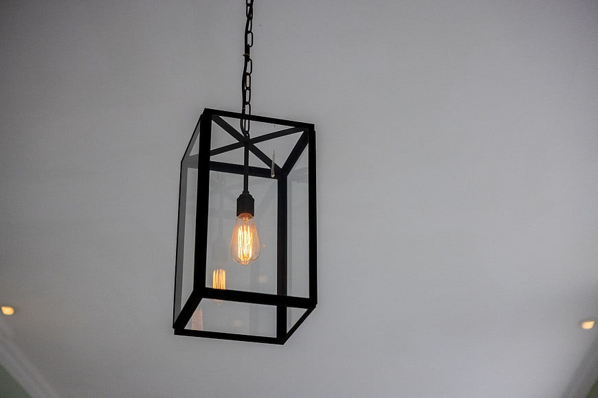 Modern black metal lantern pendant light with Edison bulb