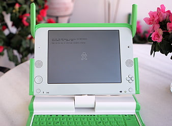 Green and White OLPC XO Laptop Booting Up