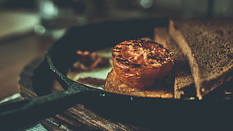 Close-up of Grilled Tomato and Toast in Cast Iron Skillet