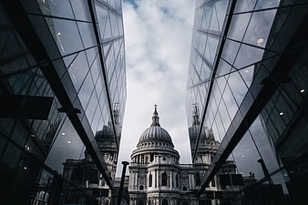 St Paul's Cathedral framed by modern glass skyscrapers
