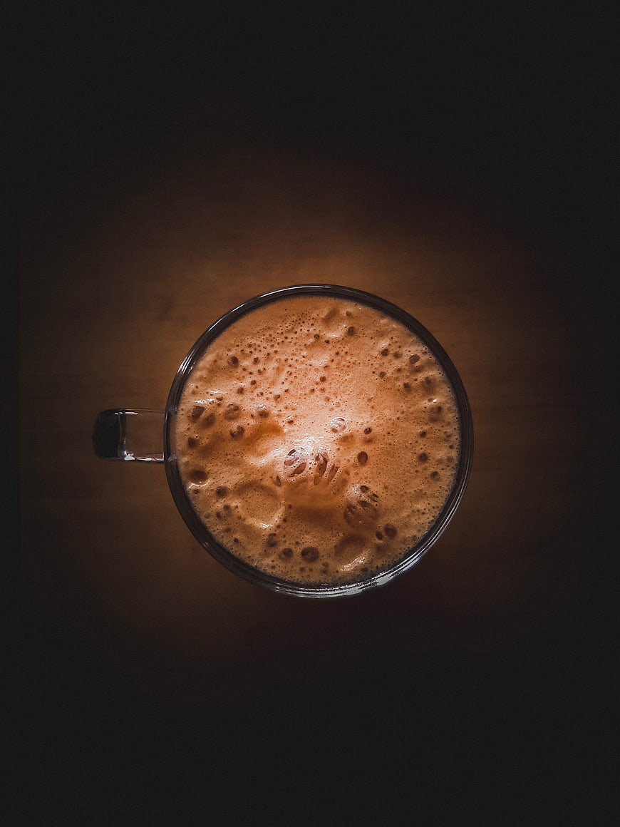 Top View of Frothy Espresso in Glass Mug