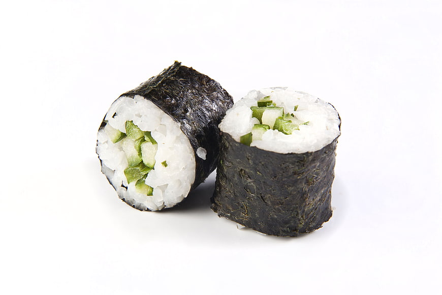 Two Cucumber Sushi Rolls On White Background