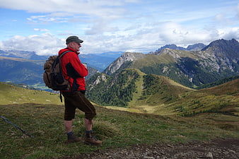 Senior Hiker Enjoying Dolomites Mountain View