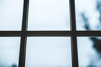 Minimalist Window Grid with Frosted Glass and Soft Light