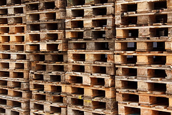 Stacked Wooden Pallets Industrial Warehouse Background