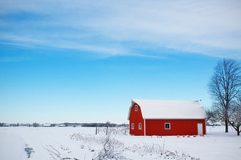Red Barn in Snowy Winter Landscape