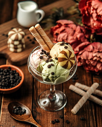 Delicious ice cream sundae with wafer cookies and chocolate chips