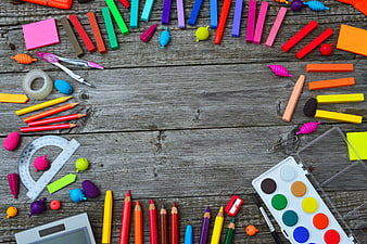 Colorful School Supplies Flat Lay on Rustic Wooden Background