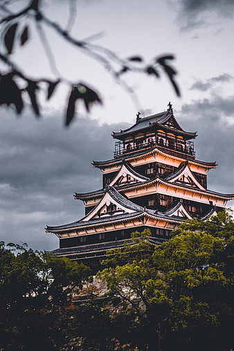 Hiroshima Castle Tower Against Dramatic Cloudy Sky