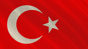 Turkish Flag Close-Up With White Crescent Moon And Star On Red Fabric