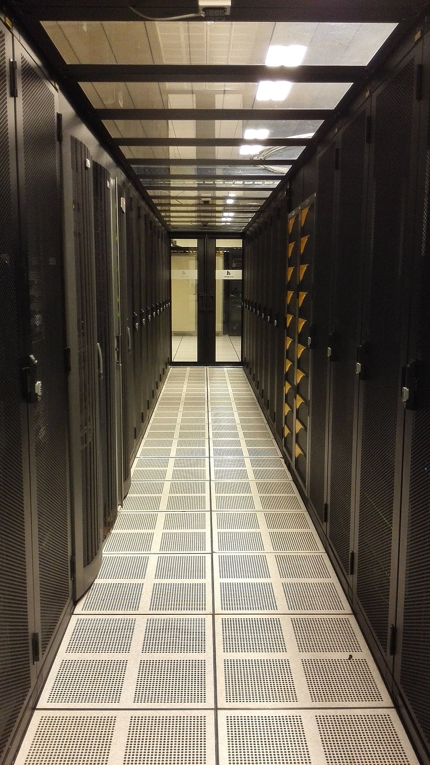 Empty Data Center Server Room Aisle With Black Racks
