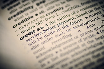 Close-up of dictionary definition for the word credit