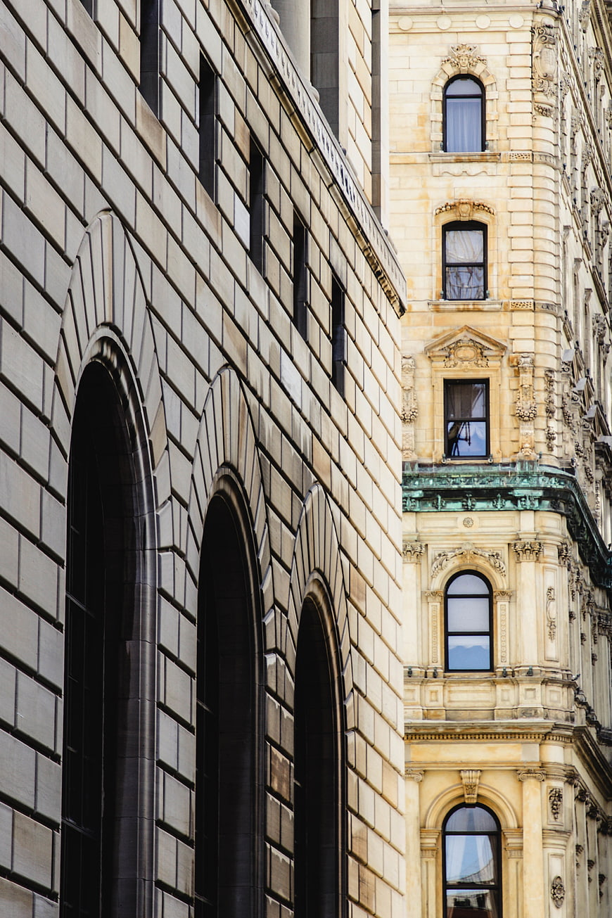 Contrasting Architectural Styles in Urban Stone Buildings