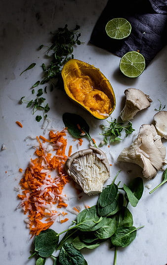Overhead view of fresh vegan bao bun ingredients on marble