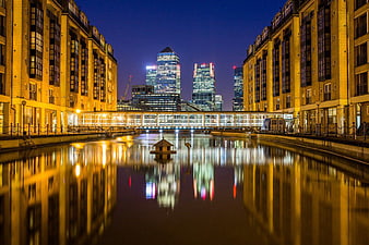 Night View of Canary Wharf with Crane Reflection in Water
