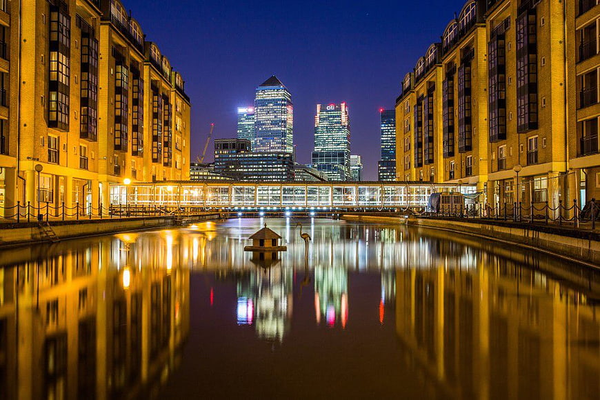 Night View of Canary Wharf with Crane Reflection in Water
