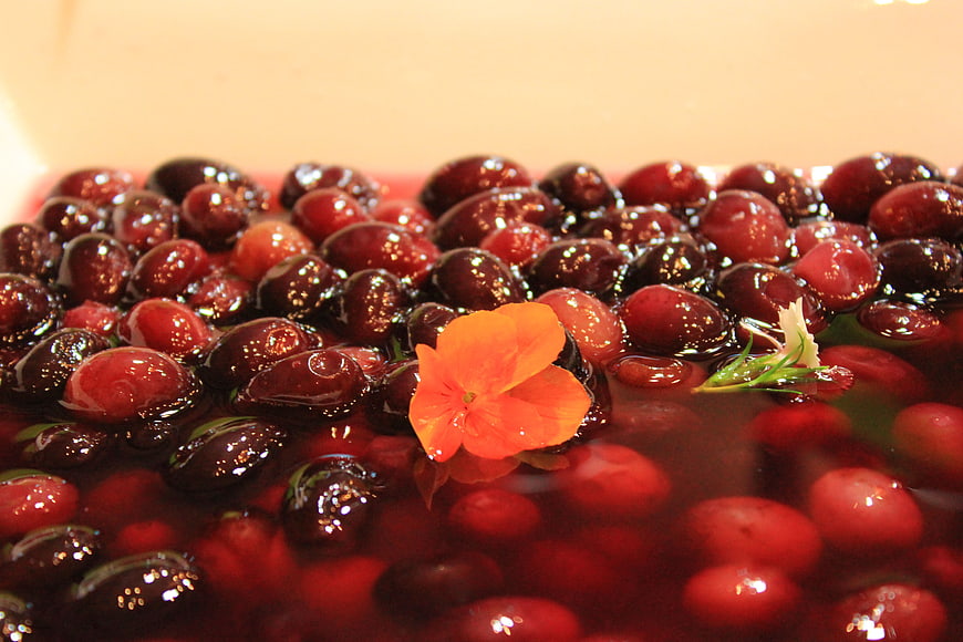 Glossy Cherries in Syrup with Orange Flower Garnish