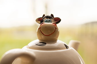 Close-up of Cute Cow Ceramic Teapot Lid