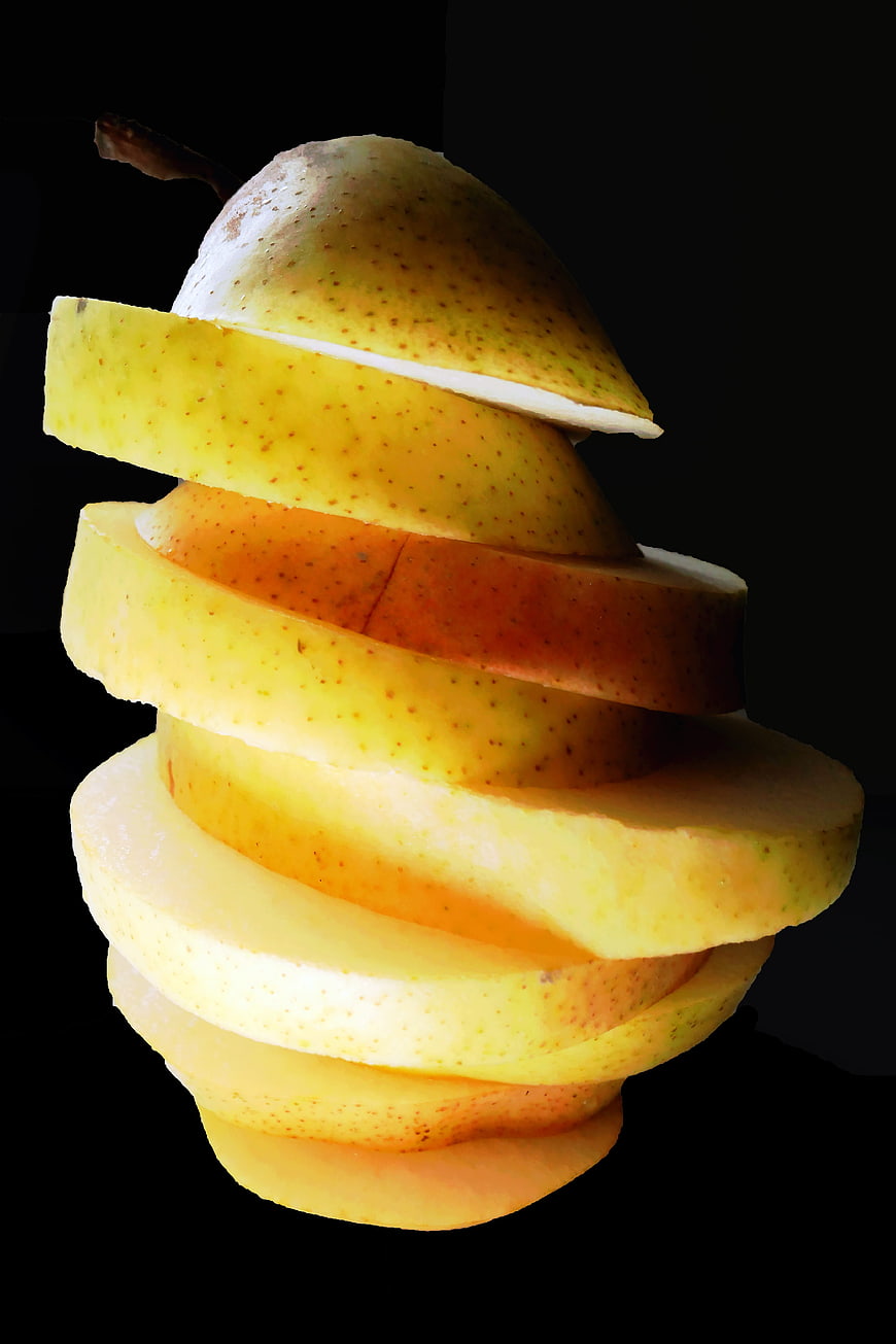 Spiral Sliced Pear on Black Background
