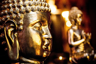 Close-up of Golden Buddha Statue in Serene Temple