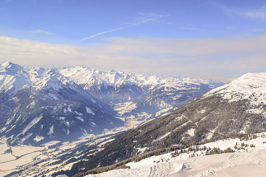 Panoramic Winter Mountain Landscape with Snowy Peaks and Valley