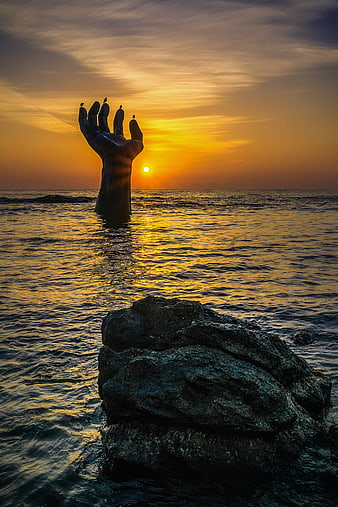 Hand of Win-Win Statue at Sunrise in Pohang