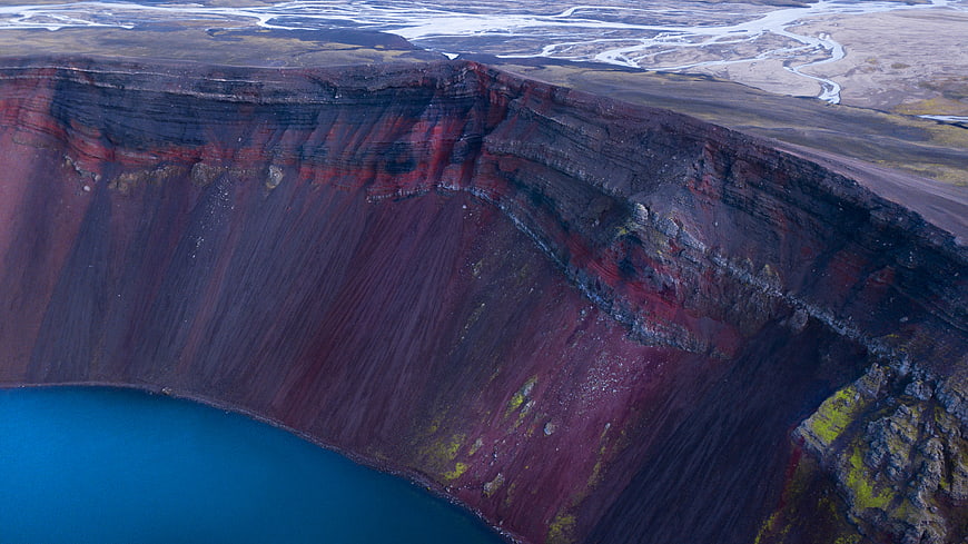 Aerial view of colorful volcanic crater lake in Iceland