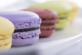 Colorful French Macarons Close-Up on White Plate
