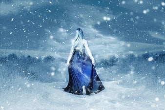 Woman in Blue Dress Walking in Snowy Winter Fantasy Landscape