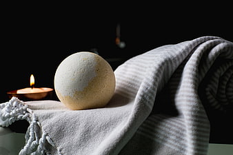 Bath Bomb on Textured Towel with Candle