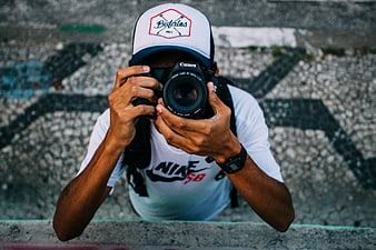 High angle view of photographer holding camera