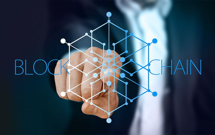 Businessman touching blockchain network concept on digital screen