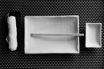 Minimalist Japanese Table Setting with Chopsticks and Oshibori