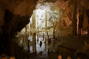 Stalactites and Stalagmites in Frasassi Caves, Italy