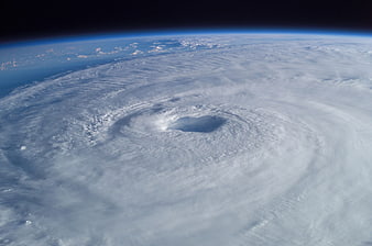 Aerial view of a massive hurricane eye from space