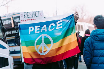 Rainbow Peace Flag at Outdoor Protest Rally