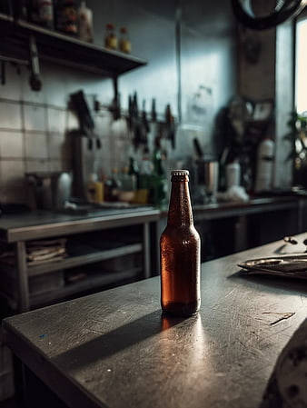 Condensation on Brown Beer Bottle in Kitchen