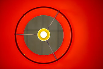Modern red circular pendant lamp with yellow center
