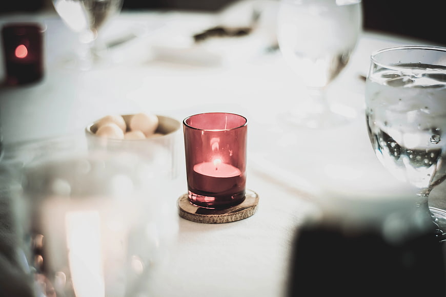 Pink Votive Candle on Elegant Dining Table Setting