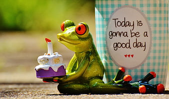 Green Frog Figurine Holding Cake With Positive Message Card