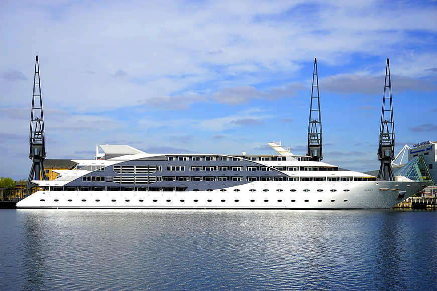 Luxury Superyacht Hamburg Docked in Port with Cranes