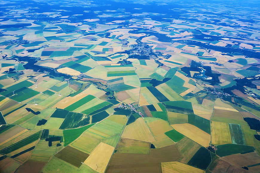 Aerial View of Patchwork Agricultural Fields and Rural Landscape